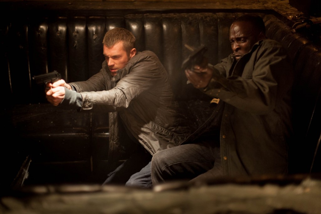 Joel Kinnaman and Michael K Williams star in Columbia Pictures' "RoboCop."